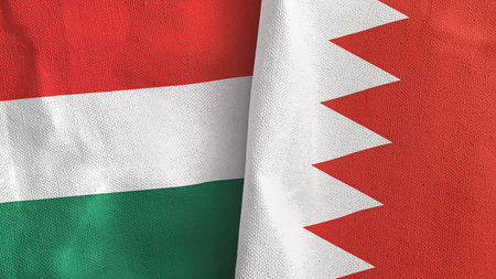 Bahrain and Hungary two flags textile cloth 3D renderingの写真素材