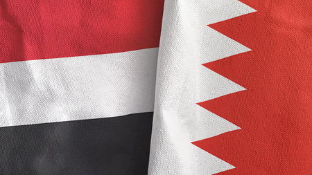 Bahrain and Yemen two flags textile cloth 3D renderingの写真素材
