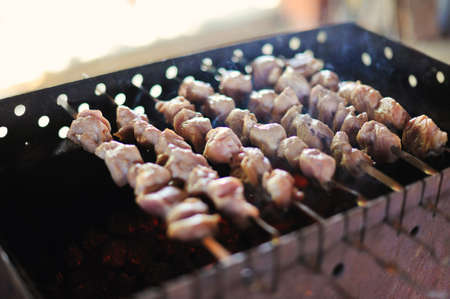 on a brazier the appetizing shish kebab from meat is friedの写真素材
