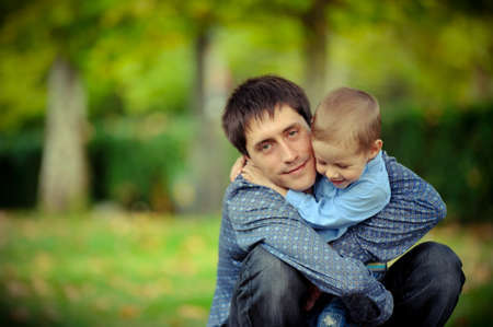 close up outdoors the father and the son embraceの写真素材