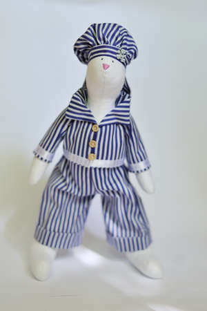 the doll a tilde hare in a striped suit sitsの写真素材