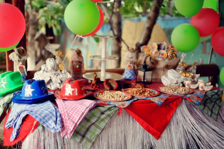 scenery of a cowboy s holiday - multi-colored balloons, hats, scarfsの写真素材