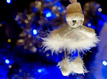 on a blue background with a large white lights Christmas Toyの写真素材
