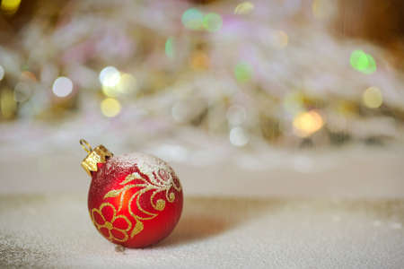 Red fur-tree sphere against garlandsの写真素材