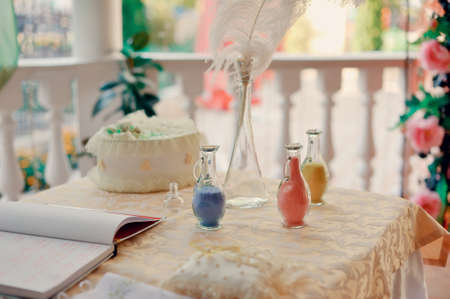 beautiful bottles with a picture and colored sand insideの写真素材
