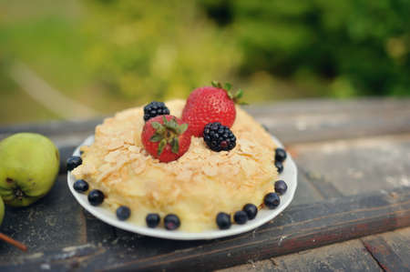 on a wooden table decorated delicious dessert ripe berries