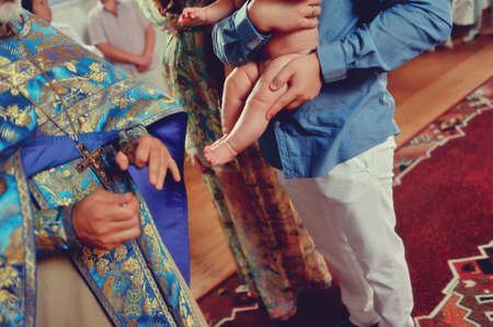 baptized in the church close-up baby s legsの写真素材