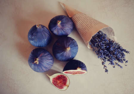 Still fresh figs and a bouquet of dry lavenderの写真素材