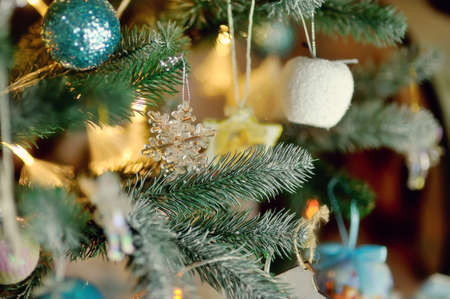 colorful bright and beautiful Christmas tree decorated with New Year s toys on the new yearの写真素材