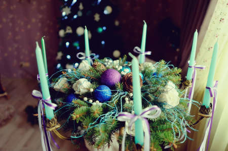 The original beautiful Christmas still life with toys, cones, balls and Christmas candlesの写真素材