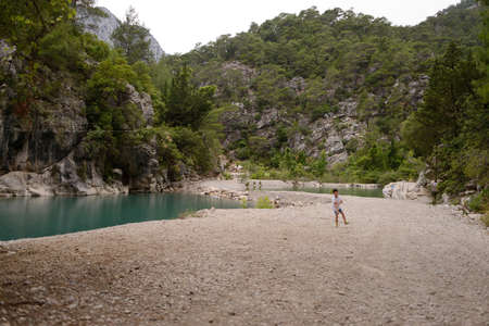little boy by the riverの写真素材