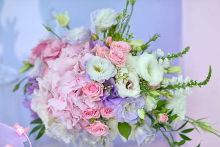 on a gentle background is very beautiful and delicate bouquet of flowersの写真素材