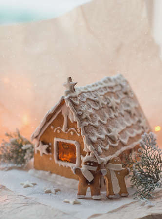 Gingerbread cookie and decorations on holiday table.の写真素材