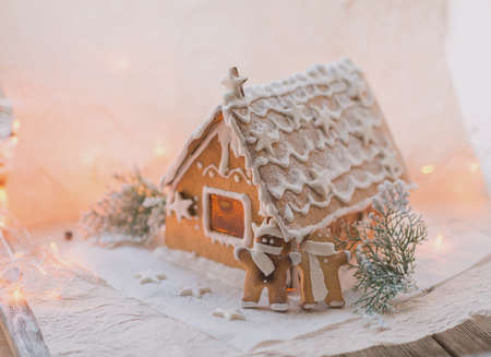 Gingerbread cookie and decorations on holiday table.の写真素材