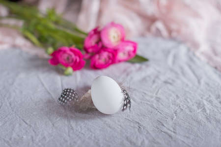Easter still-life white egg on the petals and hyacinth