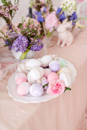 Easter still life - flowers, eggs and rabbit