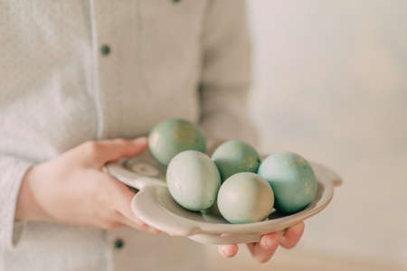 Boy with easter eggsの写真素材