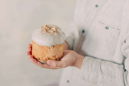 boy with Easter cake in handの写真素材