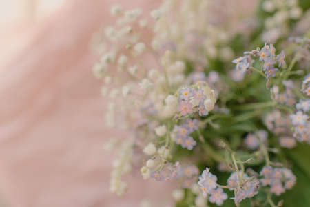 Very delicate, spring bouquet of lilies of the valley and forget-me-notsの写真素材