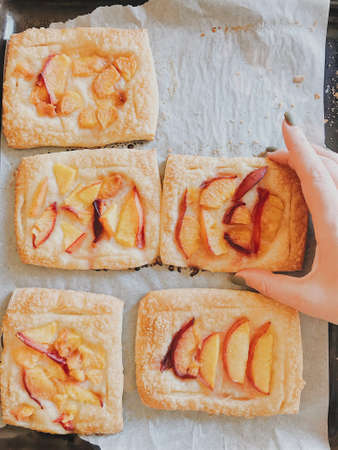 baked puff pastry with peaches