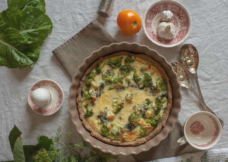Diet pie, on a shortbread crust with broccoli, drenched in cheese sauce