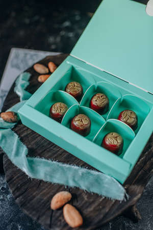 Filled chocolates. Handmade chocolate. Customized gift wrappingの写真素材
