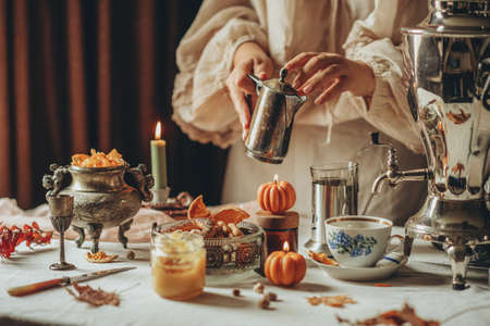 Traditional tea drinking. Table setting for tea drinking. Tea with spices.の写真素材