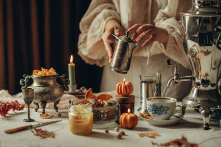 Traditional tea drinking. Table setting for tea drinking. Tea with spices.の写真素材