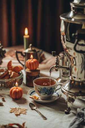 Traditional tea drinking. Table setting for tea drinking. Tea with spices.の写真素材