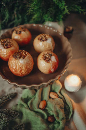 diet dish of baked apples with honey in a dark keyの写真素材