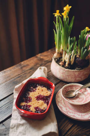 cherry pie dessert in a red ceramic plate