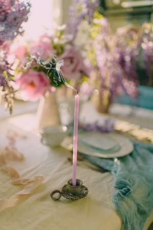 decoration of the festive table with flowers in delicate colors and light shadesの写真素材
