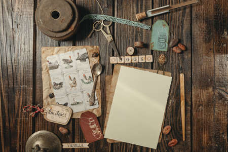 letter mockup in vintage style aged paper on wooden backgroundの写真素材