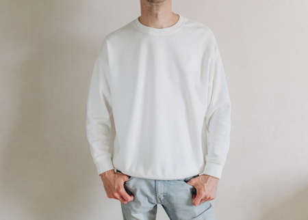 clothes in white color as a layout for your brand print or logoの写真素材