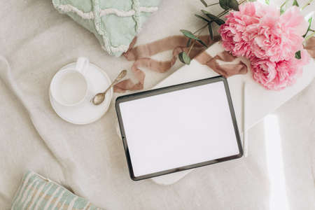 tablet mockup with white empty background, on light backgroundの写真素材