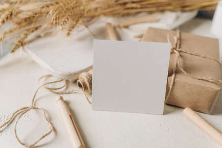Blank paper card mockup, envelope, rustic style. Eco friendly. Wedding invitation card design, greeting card template.の写真素材