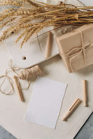 Blank paper card mockup, envelope, rustic style. Eco friendly. Wedding invitation card design, greeting card template.の写真素材