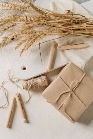 rustic style, craft paper box, twine rope, wooden clothespins, environmentally friendlyの写真素材