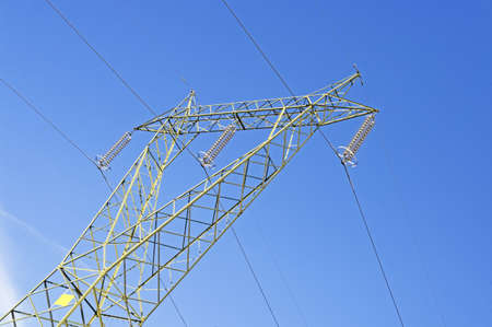 Italian electricity pylon medium voltage with blue sky backgroundの写真素材