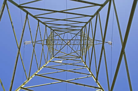 Italian electricity pylon medium voltage with blue sky backgroundの写真素材