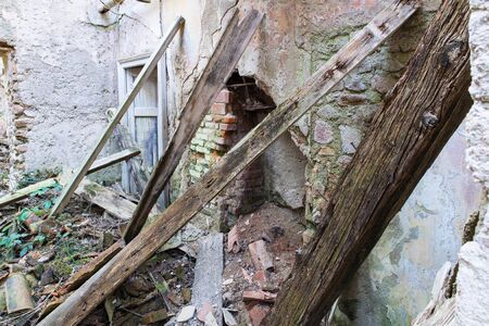 Dilapidated house, earthquake, rubble and debrisの写真素材