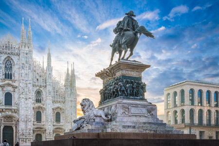 Piazza del Duomo, Milan, Italy. Equestrian monument to king Vittorio Emmanuele II at dawn. In the background the cathedral of Milanのeditorial素材