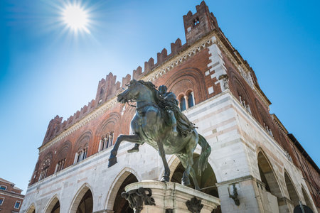 Piacenza, medieval town, Italy. Piazza Cavalli (Square horses), equestrian monument at Ranuccio I Farnese (XVII century), in the background the palazzo Gotico (Gothic palace) in the city centerのeditorial素材