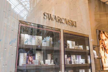 Milan, Italy - August 10, 2017: Swarovski shop in an exclusive area of Milan, the Gallery Vittorio Emanuele II (Piazza Duomo). Symbol and concept of luxury, shopping, quality and made in Austriaのeditorial素材
