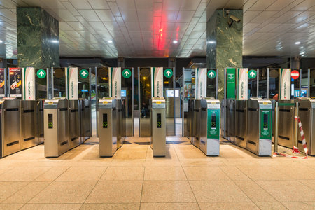 Milan, Italy - February 17, 2017: station of Cadorna, turnstile or ticket barrier of access to trains. Italian company Trenord (Trenitalia and Ferrovie Nord Milano - FNM)のeditorial素材