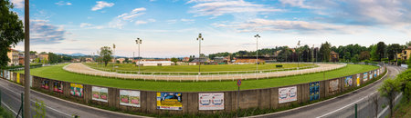 Varese, Italy - May 10, 2018: Racecourse for horse races and bets. View of the Le Bettole racecourse located in viale Ippodromo (boulevard Hippodrome) with a grass track and one in sand - groundのeditorial素材