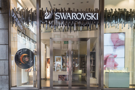 Milan, Italy - August 10, 2017: Swarovski shop in an exclusive area of Milan, corso Vittorio Emanuele II (near Piazza Duomo). Symbol and concept of luxury, shopping, quality and made in Austriaのeditorial素材