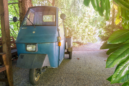 Piaggio Ape or Ape car, three wheeled vehicle produced since 1948. Ape 50, model Elestart TL3T produced between 1984 and 1985. It is an Italian symbol unique in the worldのeditorial素材