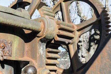 Cogwheel of an old crane. Concept of aged technology
