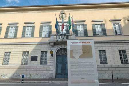 Lecco city and the municipal palace (as written), street Salvatore Sassi, Focus on information sign. Important tourist city overlooking Lake Comoのeditorial素材